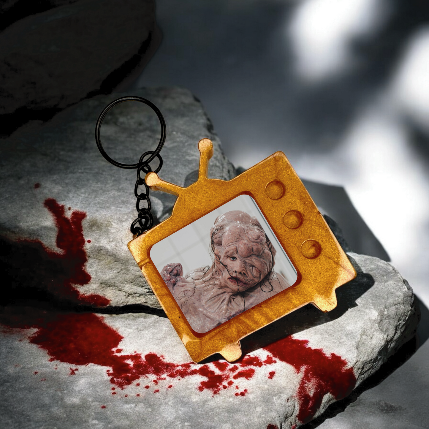 The Substance Monster TV Keychain