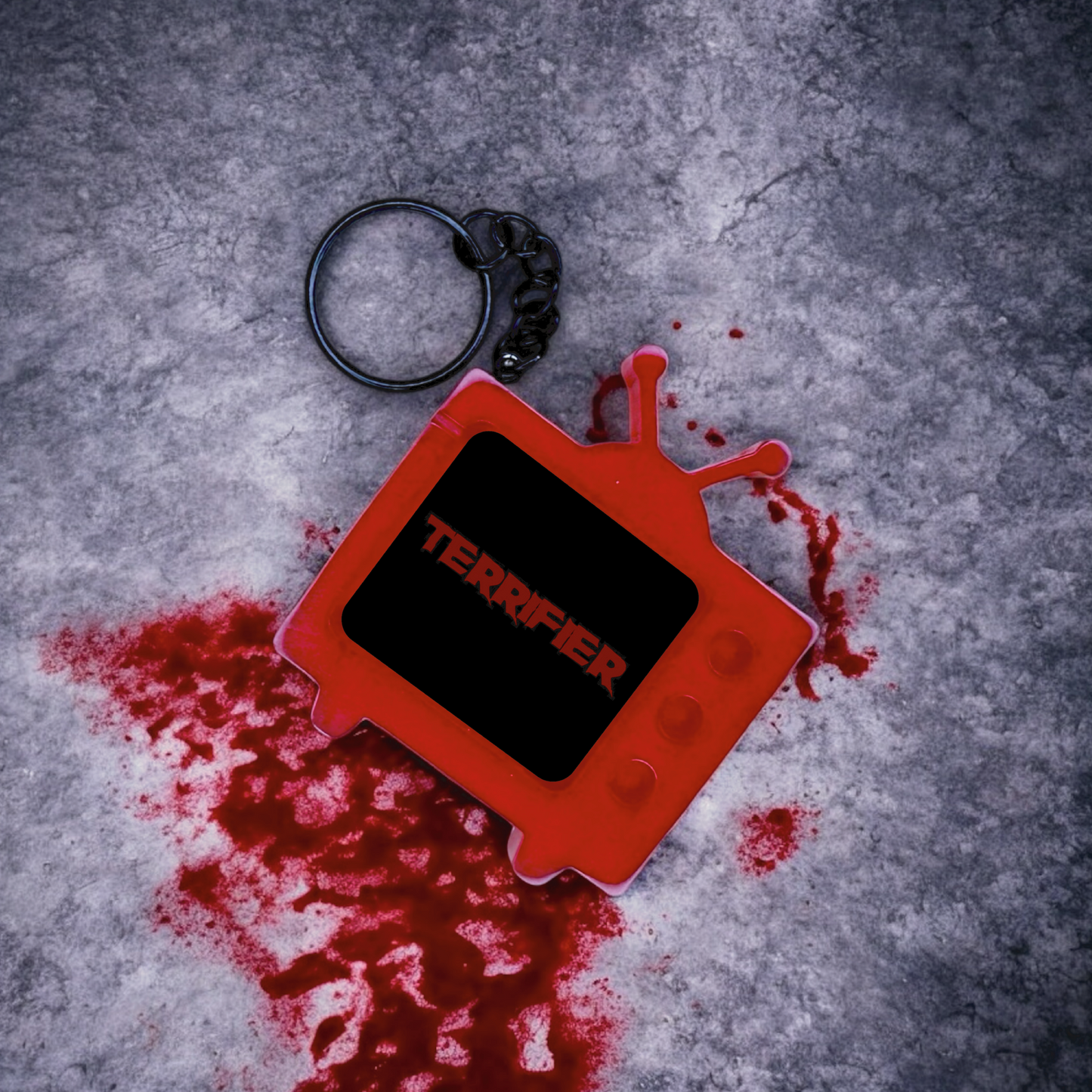 Terrifier Title Card TV Keychain